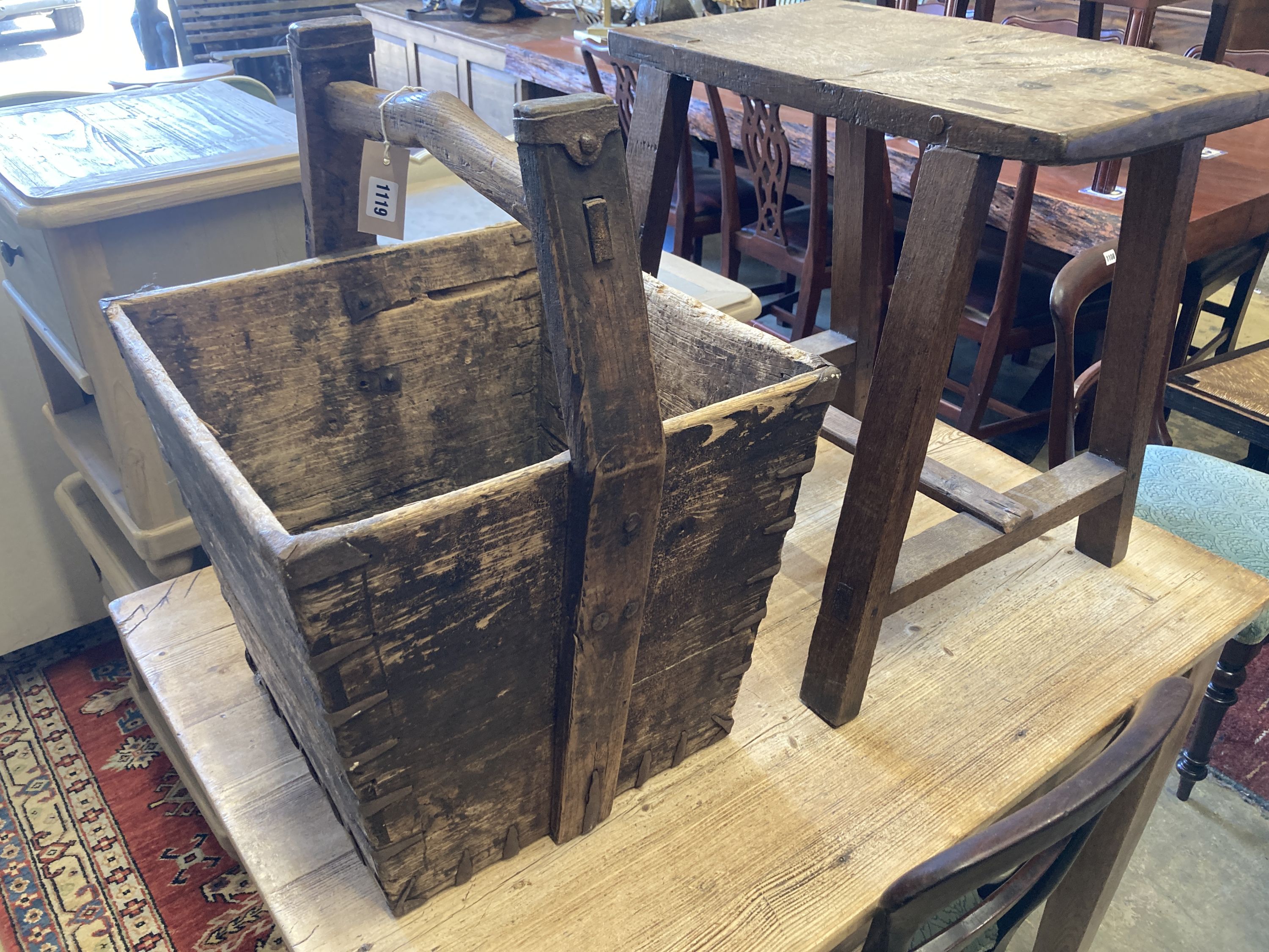 A rectangular provincial oak low table, width 55cm, depth 32cm, height 55cm together with a square Chinese bucket